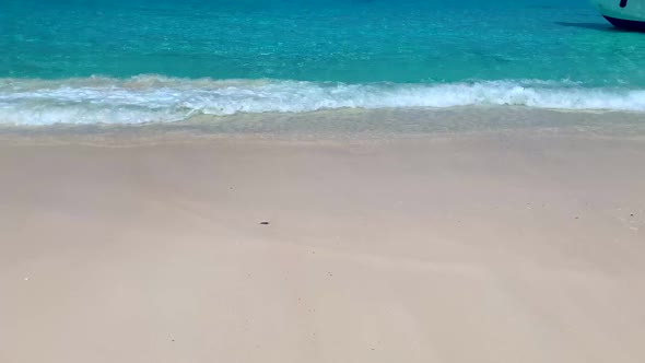 Empty Sandy Beach with White Sand and Amazing Clear Turquoise Sea alt