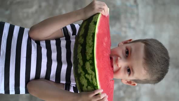Portrait of Preschooler Eating Fresh Watermelon