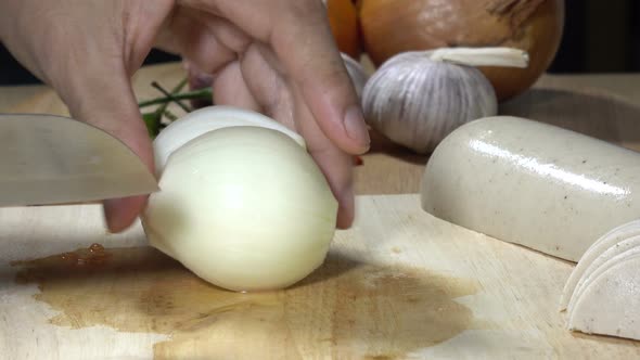 Onions Being Cut Piece