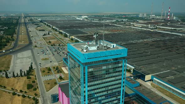 View From a Copter, a Skyscraper Roof, a High-rise Building with a Glass Facade in the City, Many