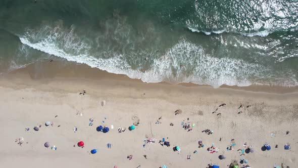 Drone Hovers Above The Beach