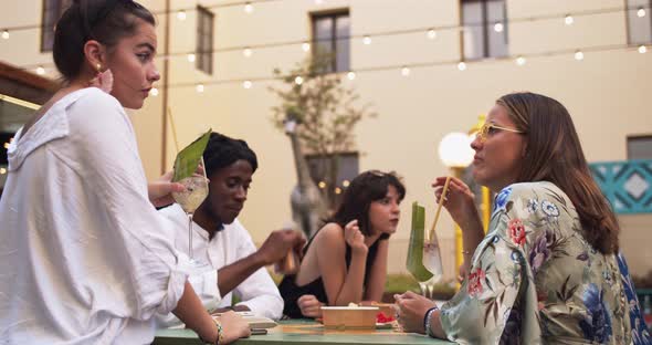 Young students in a restaurant alt