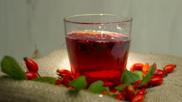 Healing Red Tea From Rosehip Berries, Herbal Infusion Homeopathy. Red Rosehip Drink alt