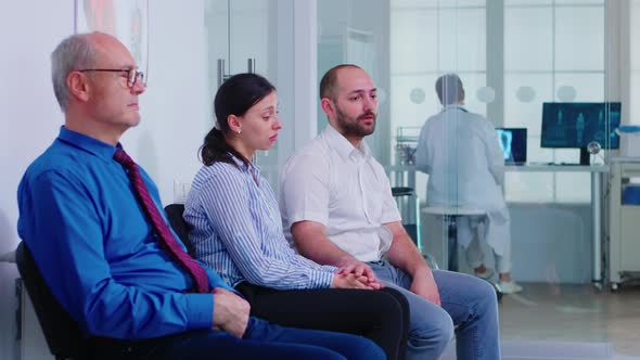 Married Couple Crying After Receiving Bad News From Doctor on Virus Test Results alt