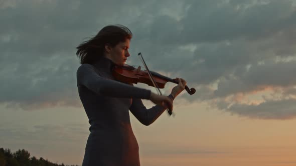 Violinist Playing Solo On Sunrise