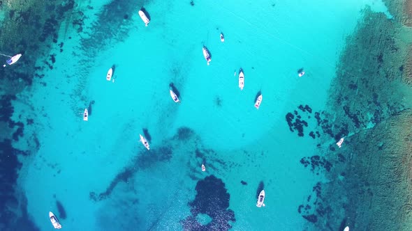 Aerial view of yachts and sailing boats in clear water, Dugi otok, Croatia alt