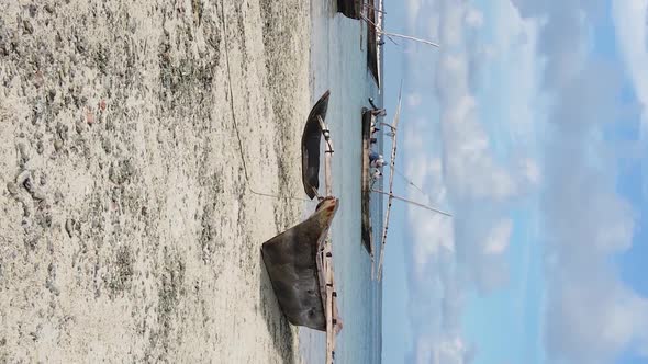 Vertical Video of Low Tide in the Ocean Near the Coast of Zanzibar Tanzania Aerial View alt
