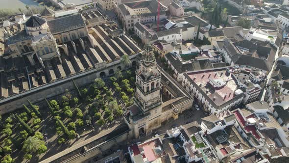 Overhead view over Islamic Mosque and Catholic Cathedral of Cordoba in Spain with bell tower. Aerial