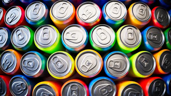 Seamless looping animation of assorted soda cans. Set of many drinks.Aerial view alt