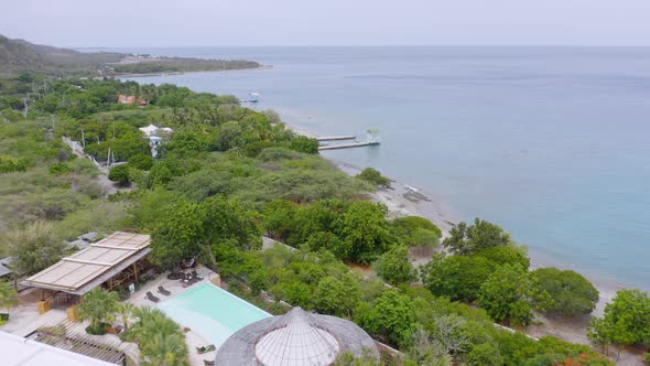 Aerial View Of Hotel And Villa Overlooking Caribbean Sea By The Bahia De Ocoa. Ocoa Bay In Azua, Dom alt