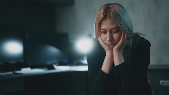 Sad Lady Leans on Palms Suffering From Burnout at Work alt