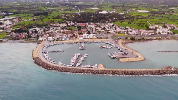 Aerial Drone Video of Zygi Marina Harbour in Cyprus Blue Mediterranean Sea Yachts Boats Greece Ocean alt