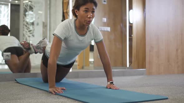 Adult Woman Training in New City Sport Gym alt