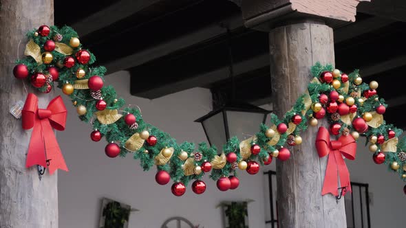 Christmas Bauble Street Decoration on the Front of a Building alt