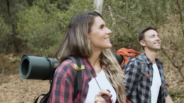 Happy Excited Active Tourists Looking Around at Landscape alt