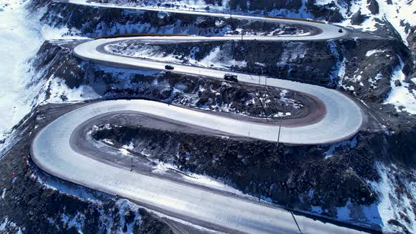 Highway road with scenic curves winding road at Andes Mountains. alt