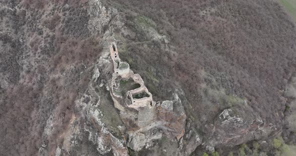 Aerial view of Drisi Castle situated on a mountain above the Tedzami River gorge. Georgia 2022 alt