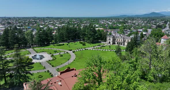 Zugdidi, Georgia - May 30 2022: Aerial view of Dadiani Palace in the center of Zugdidi city alt
