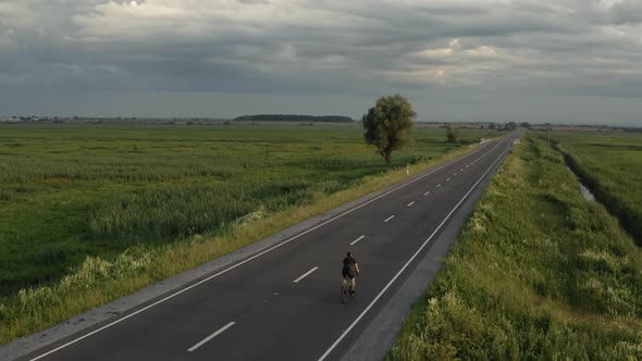 Sportsman is Training on a Bike alt