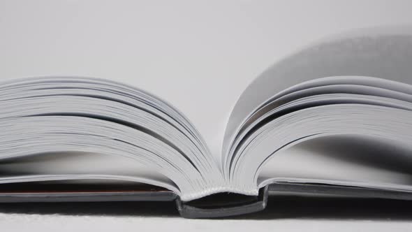 Open book with turning pages. Close-up. Reading concept.