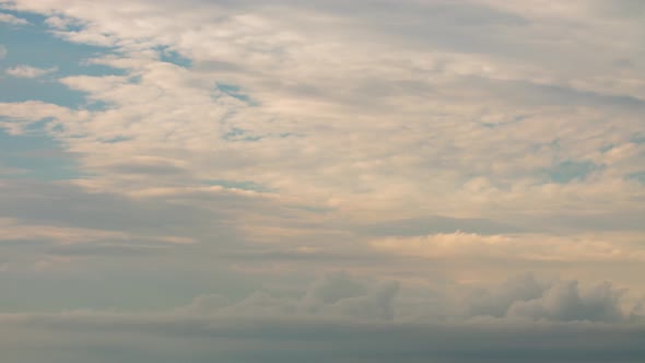 Fluffy White and Grey Clouds Moving Fast in Time-lapse. Idyllic Cloudy Heaven Background. Timelapse
