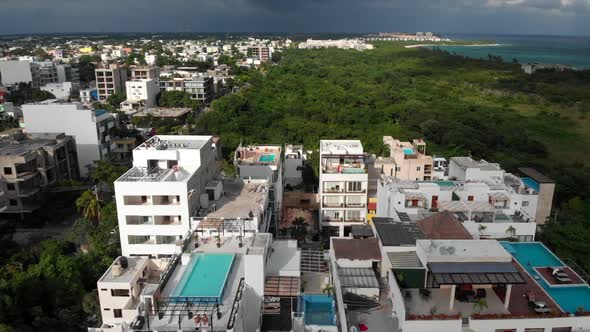 Flying Around a Rooftop Pool in a Small Caribbean Town Before Storm