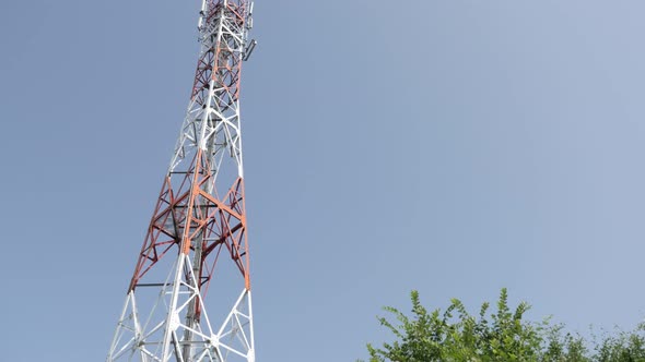 Telecommunication  equipment on antenna system 4K 3840X2160 UHD tilting  footage - Outdoor repeater  alt