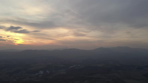 Beautiful colors of dawn above Eastern Serbian landscape 4K drone footage alt