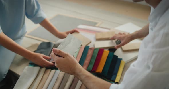 The Designer and Architect Select Samples of Finishing Materials for the Project alt