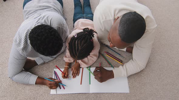 Top View Unrecognizable African American Family Afro Black Parents with Ethnic Daughter School Girl alt
