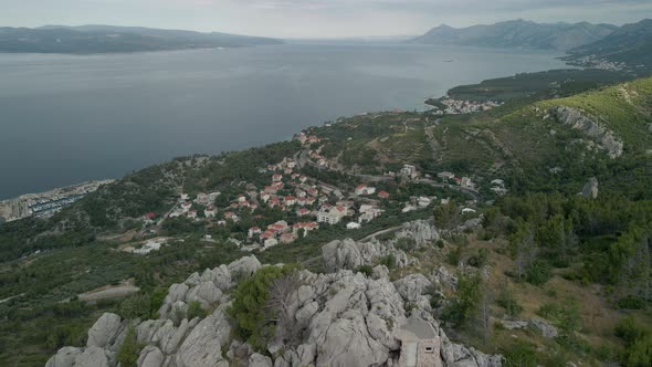 Drone View of a Small Town in the Makarska Riviera Region in Croatia with the Stunning Adriatic Sea