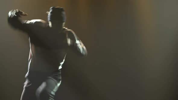 Stylish Young Man Alone Dancing Street Breakdance, Hip Hop in the Studio. Silhouette of a Man alt