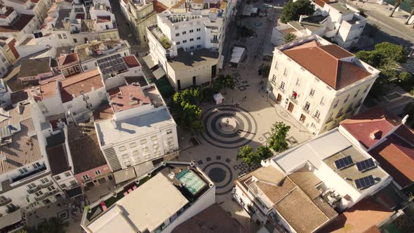 Gil Eanes square and Posto de Turismo,  Lagos, Algarve, Portugal. Orbiting aerial shot alt