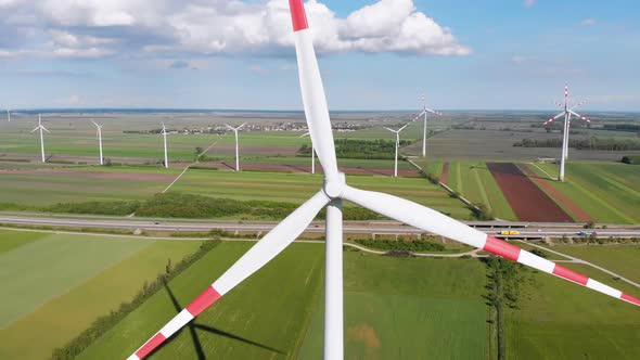 Aerial View of Wind Turbines Farm and Agricultural Fields. Austria alt
