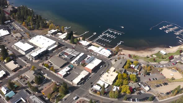 Aerial over the downtown area of McCall, Idaho. Payette Lake in the backdrop. alt