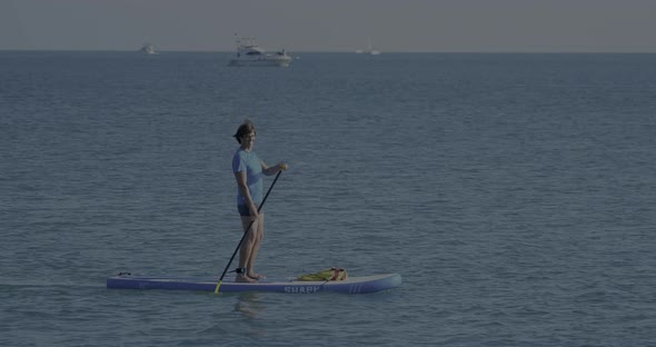 Handsome Paddle Boarder alt