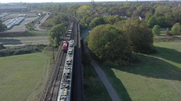 Commuter Train Stopped to Allow a Freight Train to Pass alt