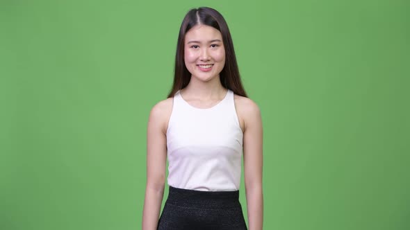 Young Beautiful Asian Businesswoman Smiling