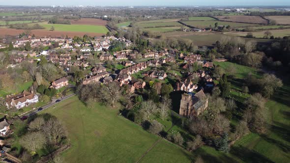 Aerial Stoneleigh Historic Village And Church In Winter