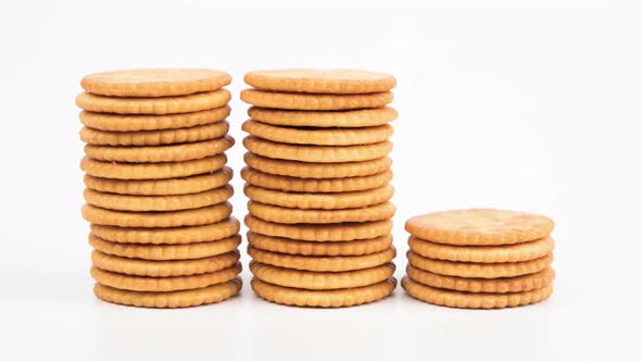 Stop motion animation Biscuits Cookies stacks on White background.