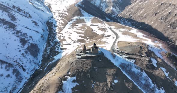 Aerial view of Gergeti Trinity Church, Tsminda Sameba in Kazbegi. Georgia 2022 alt
