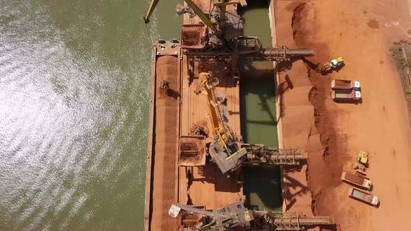 Industrial Cargo Port With Operating Cranes On The Danube River, Aerial View alt