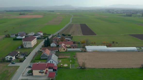 Aerial view of rural community and farmland in Slovenia alt