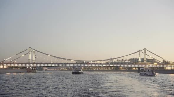 Beautiful Rippling River Crossed By the Bridge Decorated By Lights alt