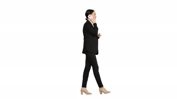 Bossy Businesswoman Talking on Her Phone on White Background alt