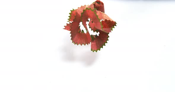 Sharpenered Color Pencil against White Background, Slow Motion 4K alt