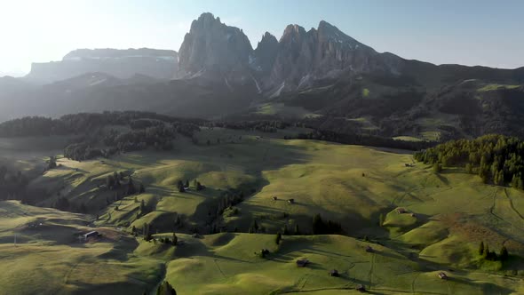 Drone Flying High Above Seiser Alm Valley in Dolomites Mountain Range in Northern Italy