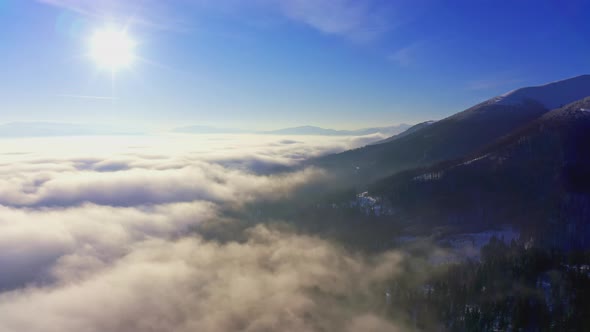 Wonderful View of Extraordinary Cloudy Valley and Bright Orange Sunset alt