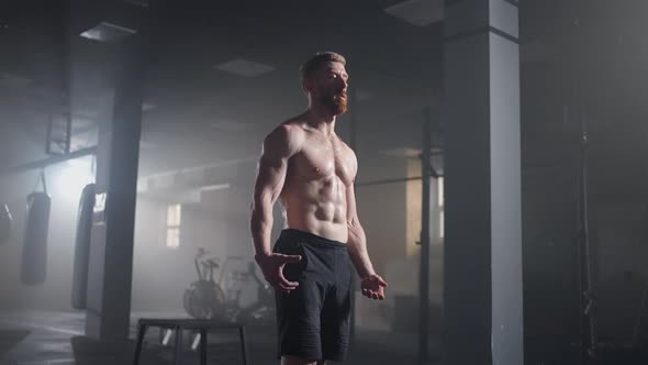 Exhausted Young Men Resting After Intensive Workout in Gym alt