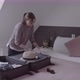 Senior woman in bedroom packing suitcase for summer holiday, day in life - VideoHive Item for Sale